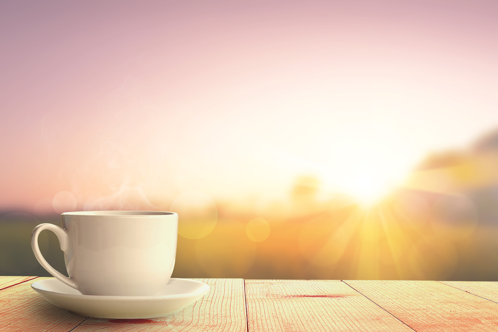 hot coffee and sunrise nature background